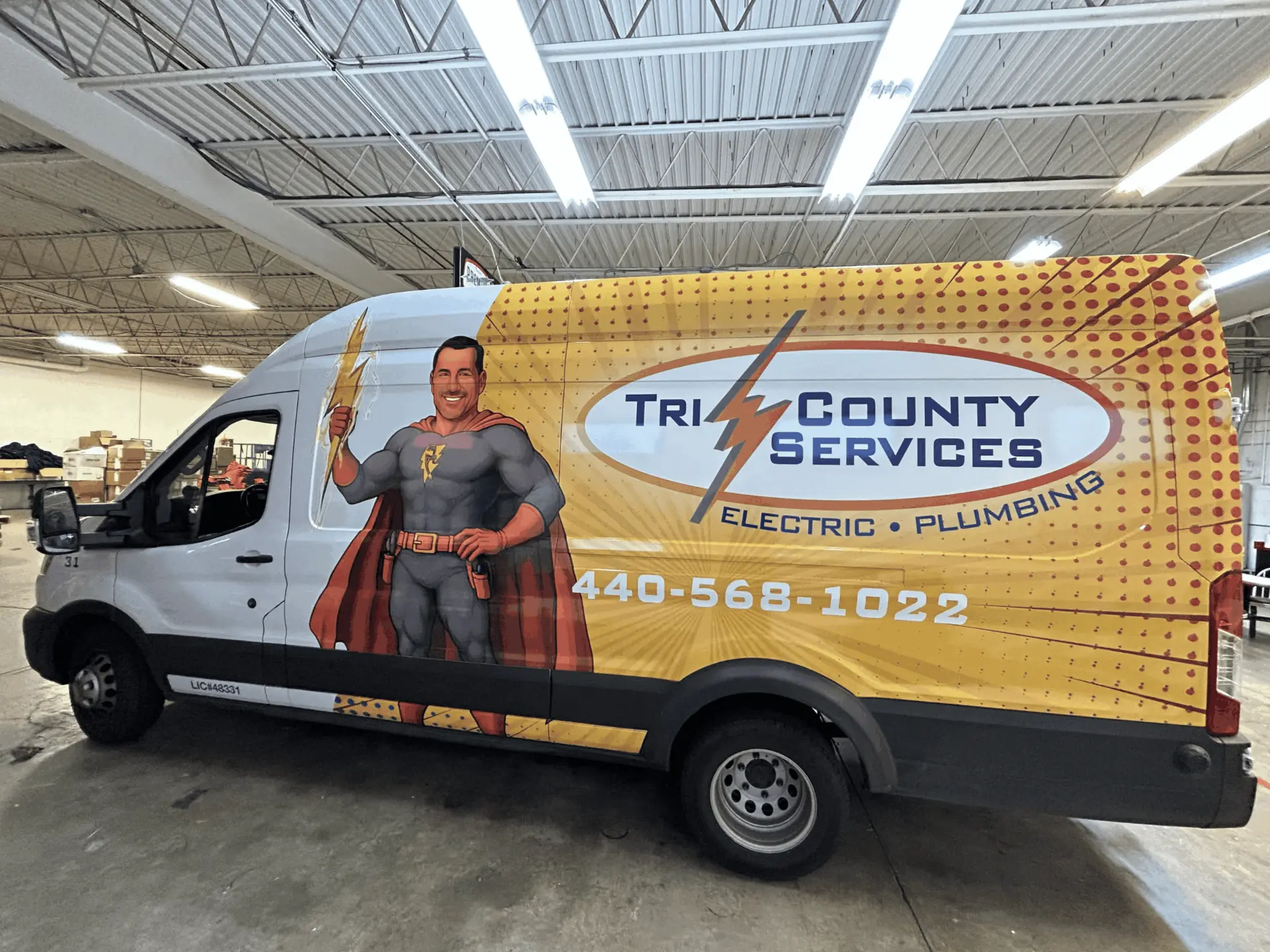 A Tri-County Services truck with a bold, unforgettable wrap